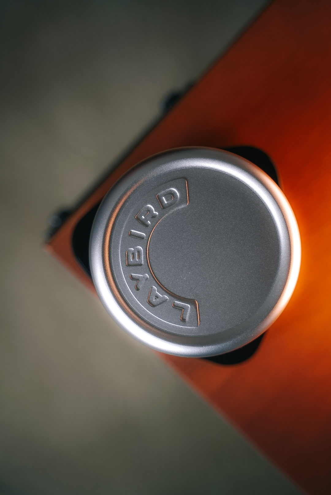 Top-down view of TriSpin LAYBIRD embossed cap